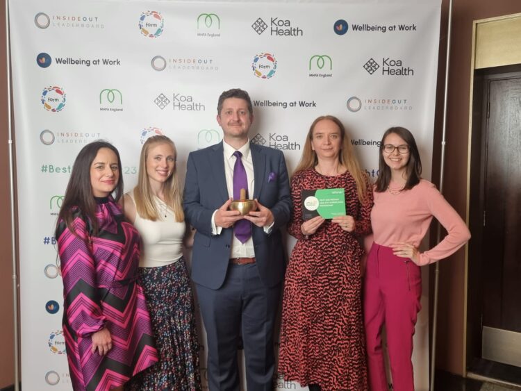 workplace health team receiving award