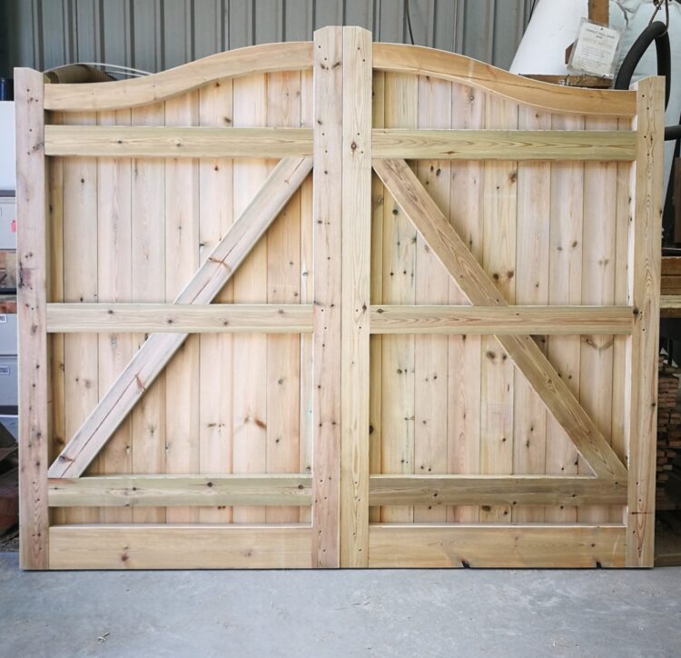 Rear view of a pair of Crestala's Hartfield gates with a solid bottom rail