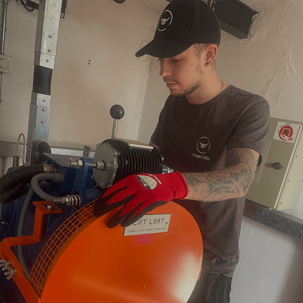 Lift Engineer checking a lift motor.