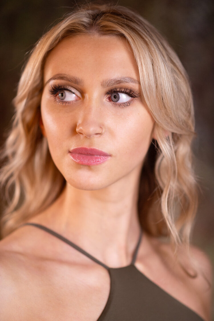 Portrait of blonde woman looking off camera