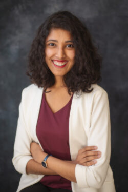 Portrait of Indian woman smiling at the camera