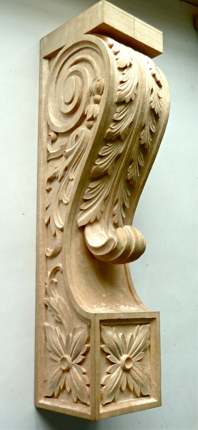 Woodcarving of a bracket.